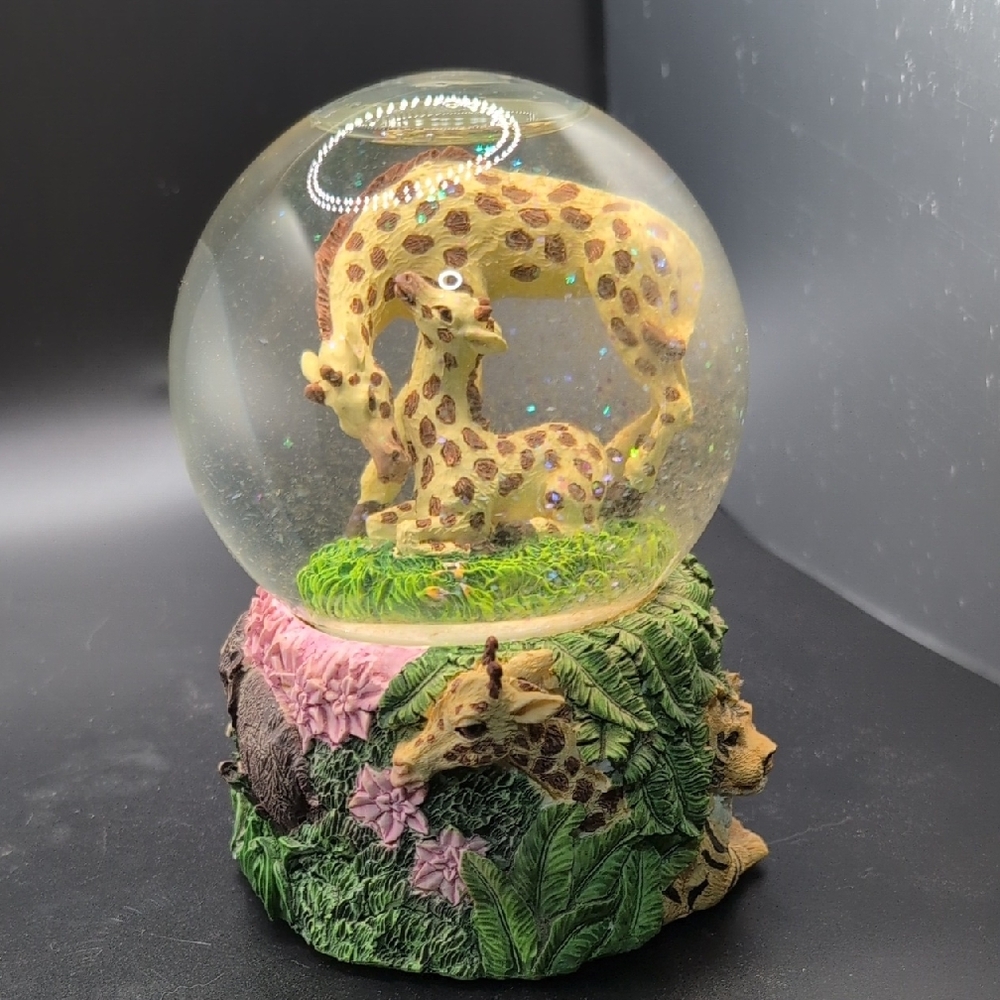 Giraffe Family Snow Globe with Green and Brown Base